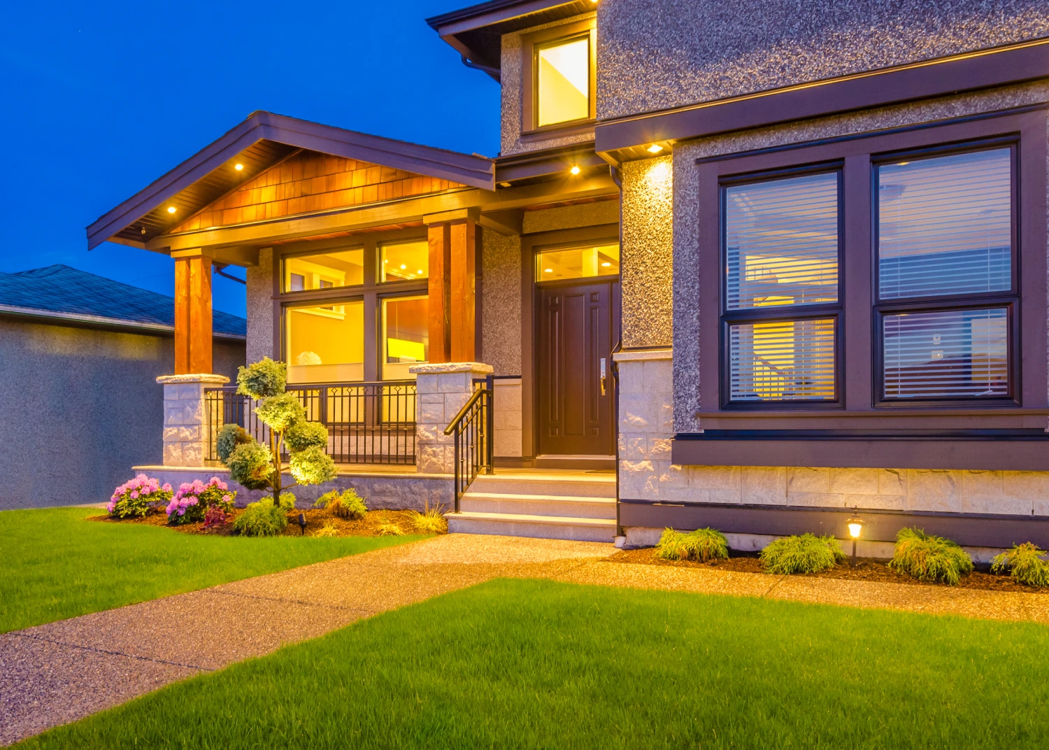 Modern house exterior with porch lighting